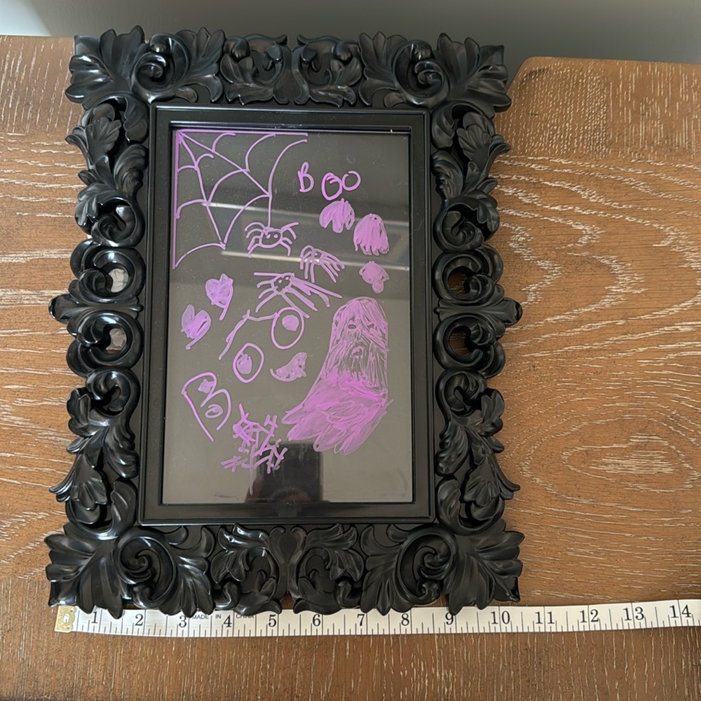Light up plastic picture frame with purple marker
